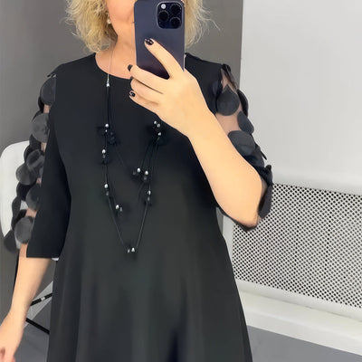 Vestido longo oversized com decoração