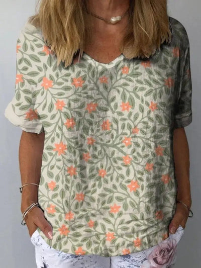 Aida - Camisa casual para mulher em algodão e linho com um bonito design floral e estampado artístico